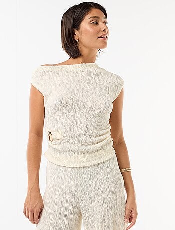 Top stretch uni asymétrique sans manches