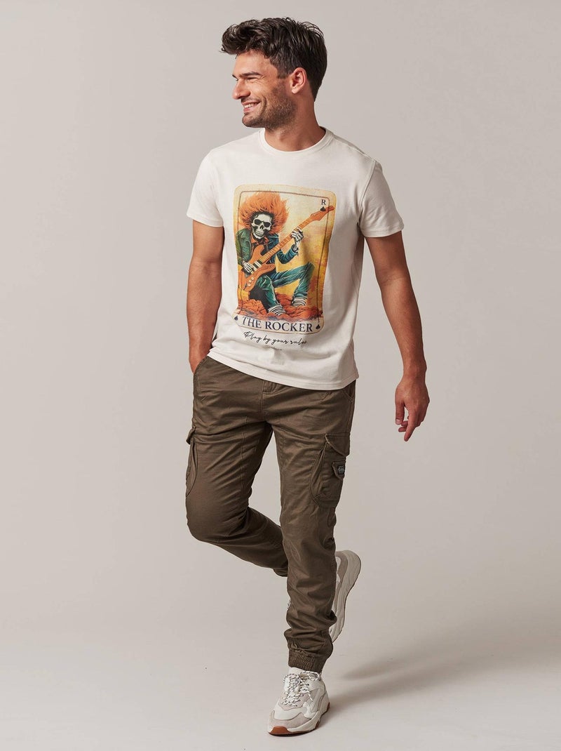 tshirt col rond avec imprimé carte avec rockeur et tête de mort 'Deeluxe' Beige - Kiabi