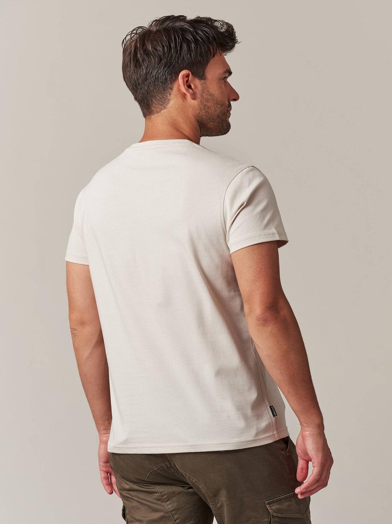 tshirt col rond avec imprimé carte avec rockeur et tête de mort 'Deeluxe' Beige - Kiabi