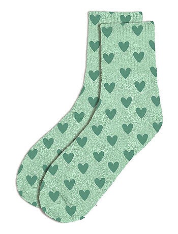 Une paire de chaussettes paillettes coeurs verts