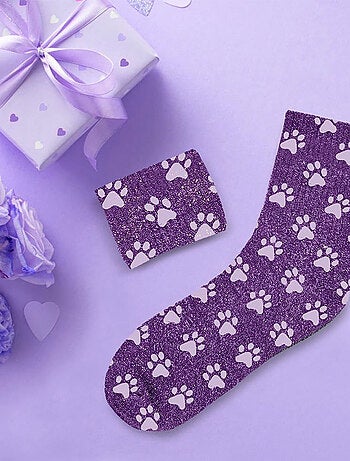 Une paire de chaussettes paillettes pattes de chat