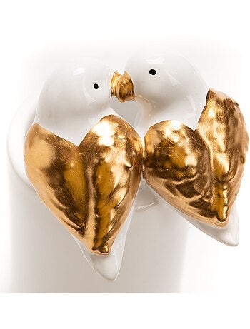 Vase en pierre avec couple oiseaux