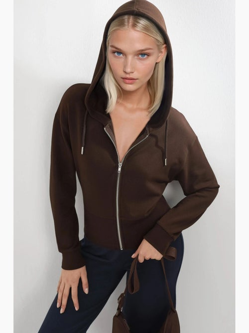 Veste à capuche et manches longues busem - Kiabi Veste à capuche et manches longues busem - Kiabi