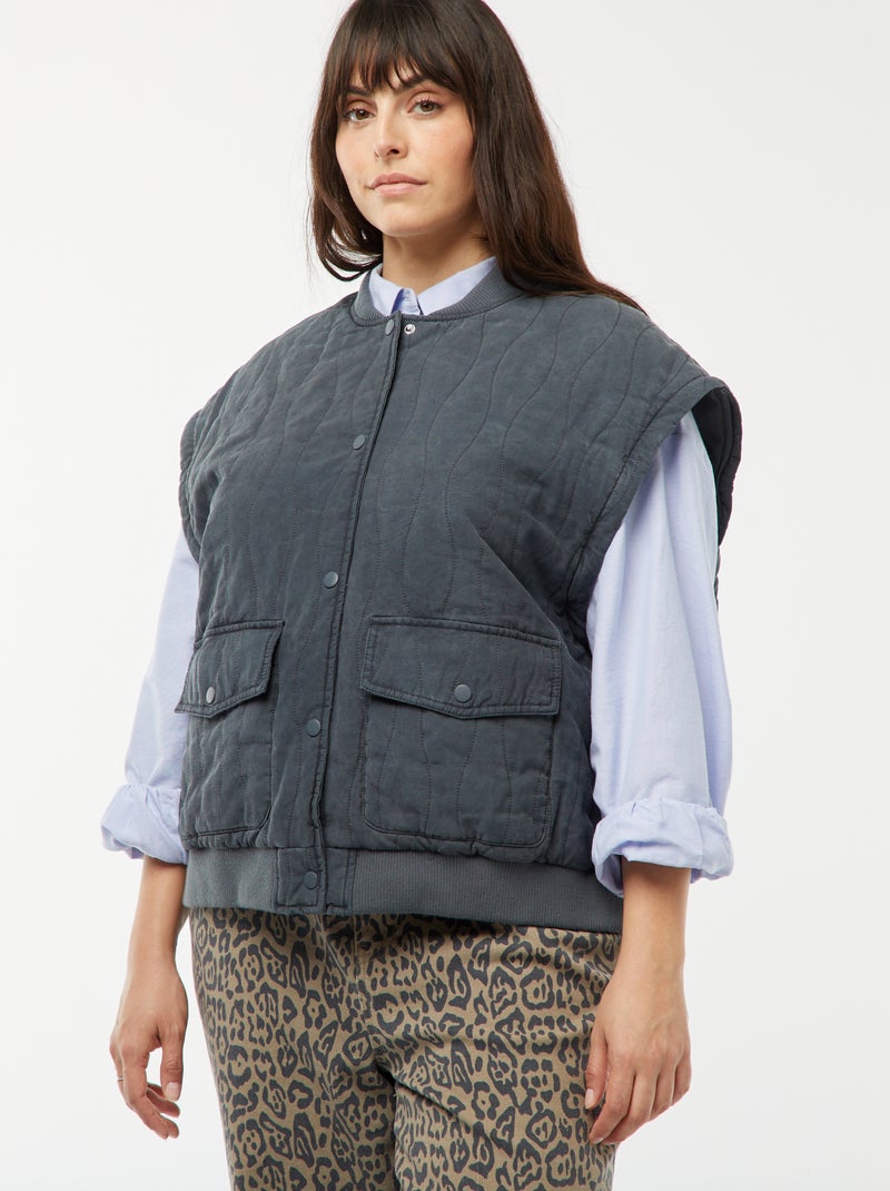 Veste en coton matelassée avec vagues verticales NOIR - Kiabi