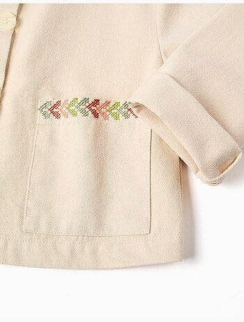 Veste en sergé avec broderie au point de croix