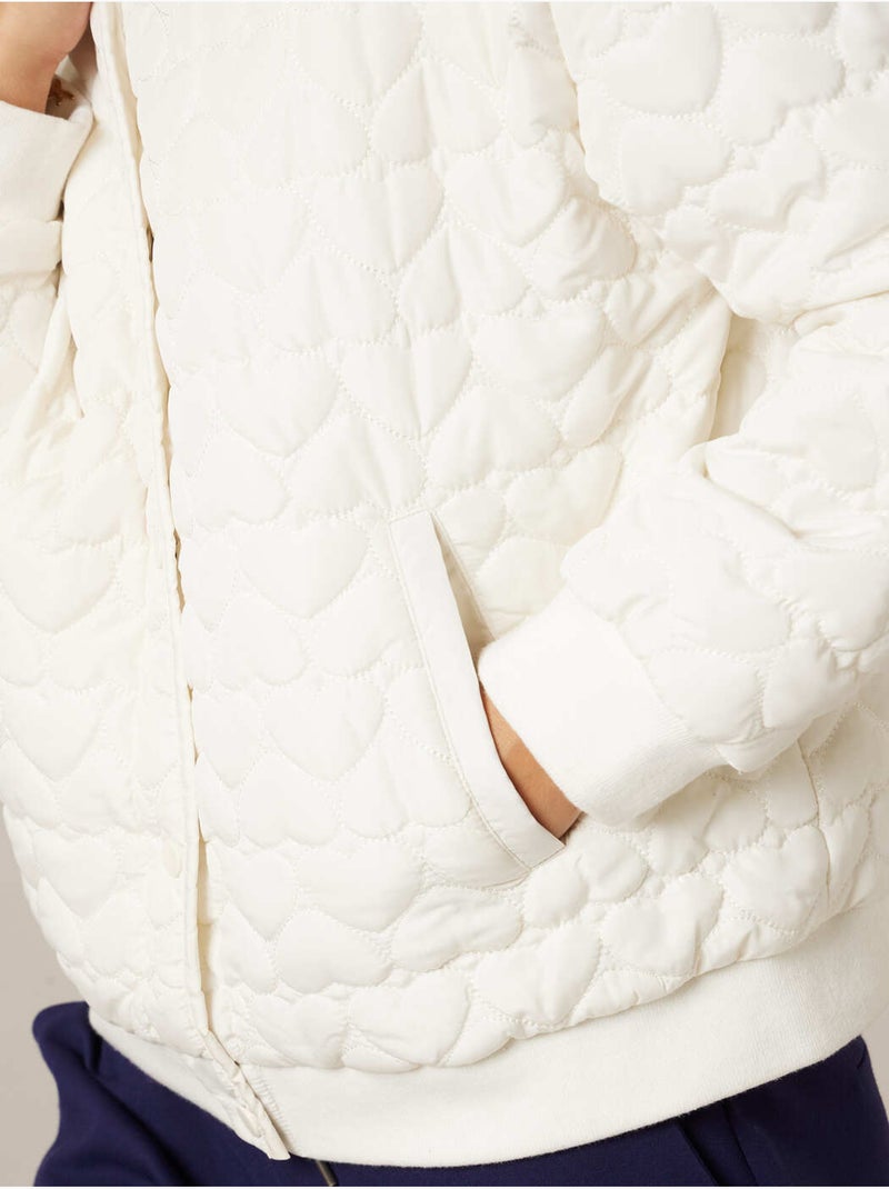 Veste femme matelassée a motif coeurs discrets 'deeluxe' Blanc cassé - Kiabi