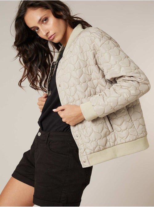 Veste femme matelassée A motif coeurs discrets 'Deeluxe' - Kiabi