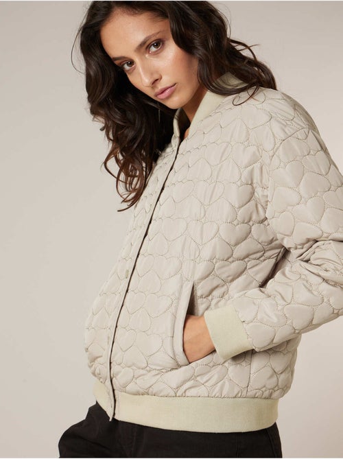 Veste femme matelassée A motif coeurs discrets 'Deeluxe' - Kiabi