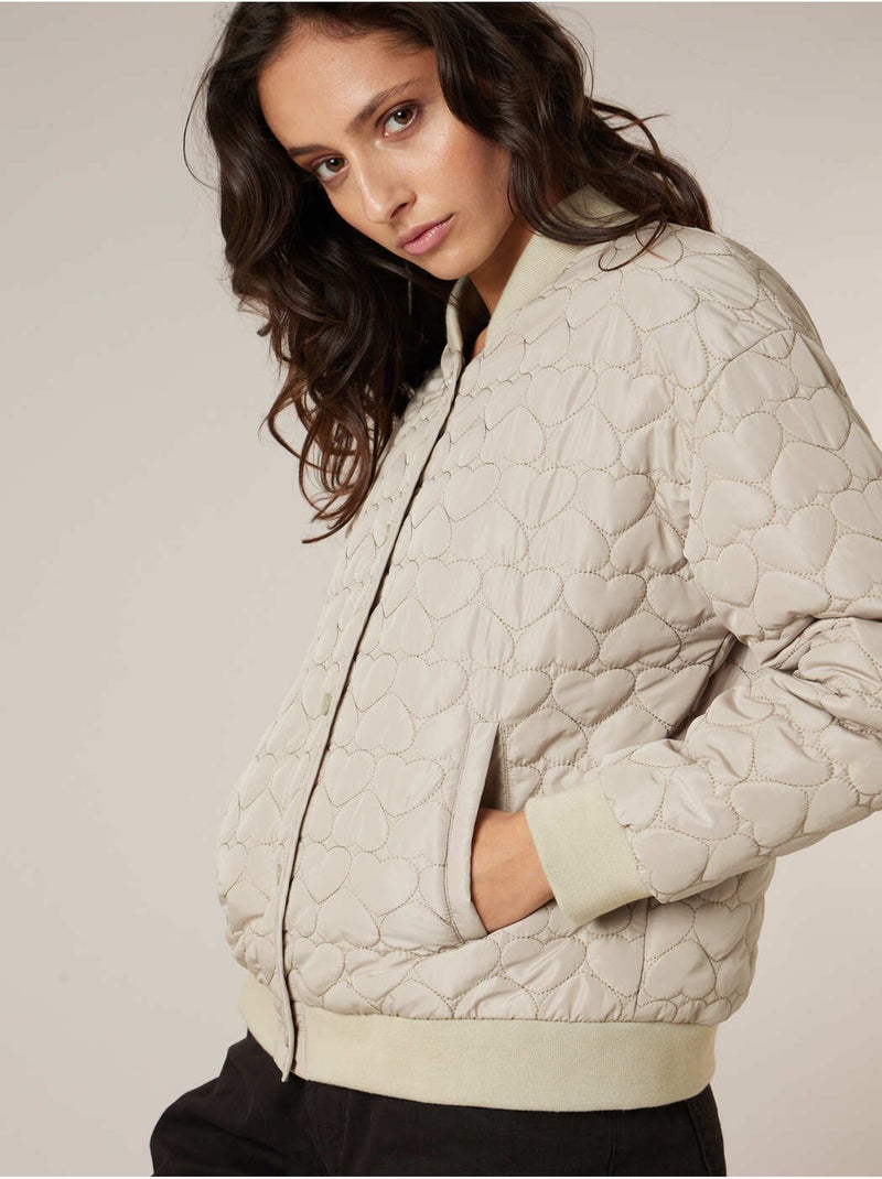 Veste femme matelassée A motif coeurs discrets 'Deeluxe' Vert tilleul - Kiabi