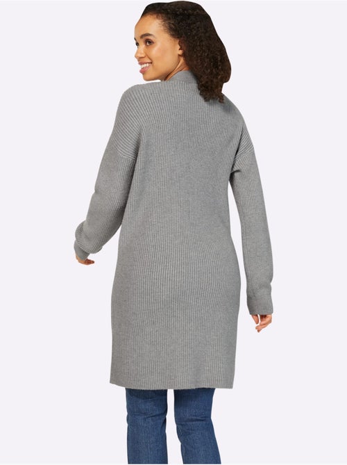 Veste longue en tricot 2 poches plaquées - taille standard - helline - Kiabi Veste longue en tricot 2 poches plaquées - taille standard - helline - Kiabi