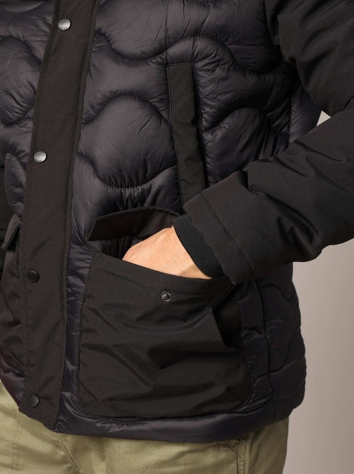 Veste matelassée avec capuche et poches plaquées
 'Deeluxe' - Kiabi