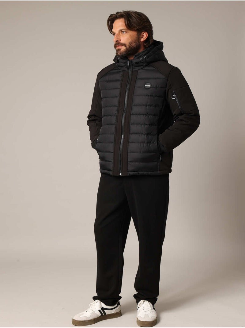 Veste matelassée avec capuche et poches zippées
 'Deeluxe' Noir - Kiabi