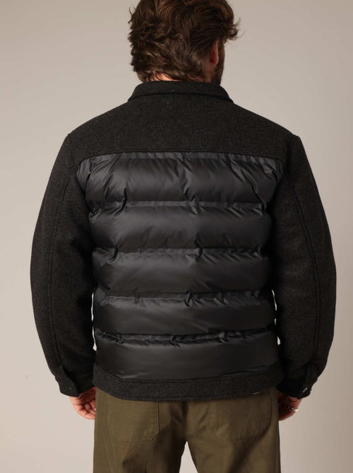 Veste matelassée bi-matière avec poches plaquées
 'Deeluxe' - Kiabi