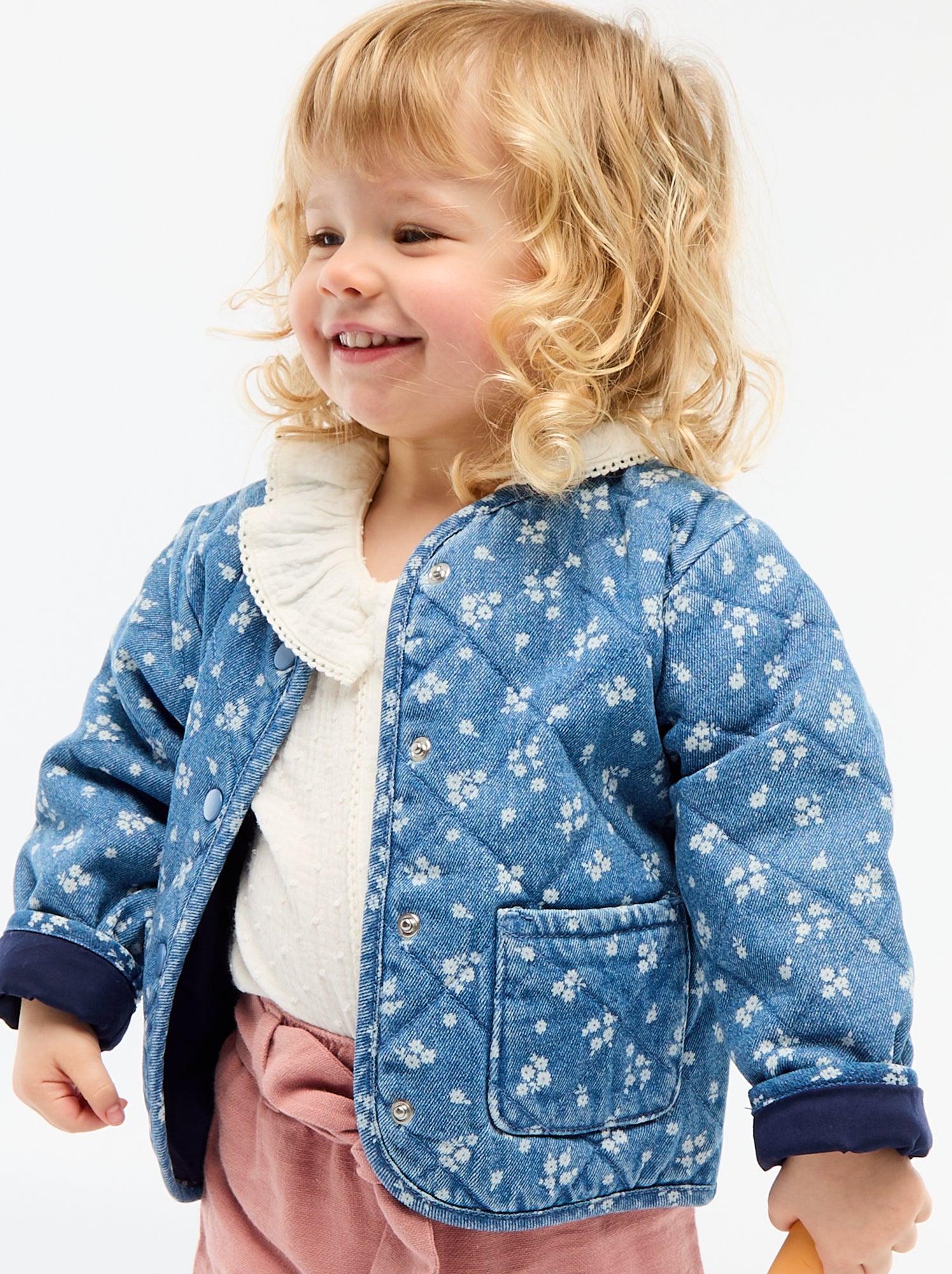 Veste matelassée en denim avec ouverture à pressions