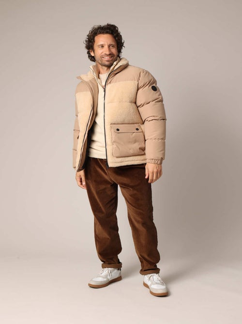 Veste matelassée homme en sherpa et toile, look décontracté et ultra confort.
 'Deeluxe' - Kiabi