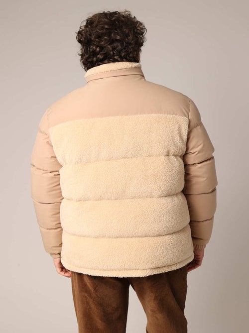 Veste matelassée homme en sherpa et toile, look décontracté et ultra confort.
 'Deeluxe' - Kiabi