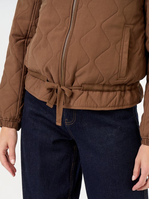 Veste matelassée resserable à la taille - Kiabi Veste matelassée resserable à la taille - Kiabi