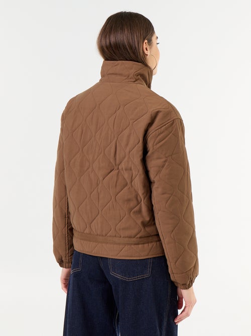 Veste matelassée resserable à la taille - Kiabi Veste matelassée resserable à la taille - Kiabi