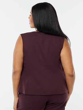 Veste sans manches avec ouverture boutonnée