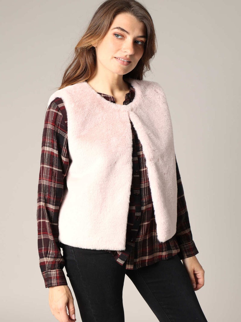 Veste sans manches en fausse fourrure douce.
 'Deeluxe' Rose - Kiabi