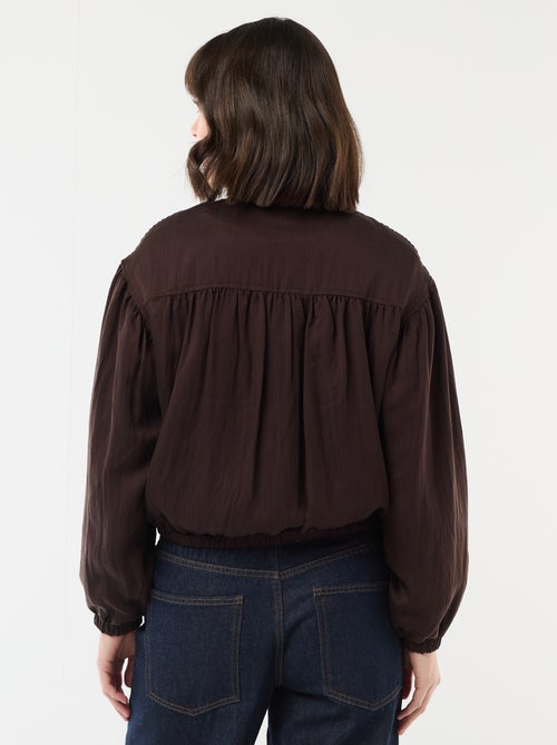 Veste unie zippée avec manches bouffantes - Kiabi