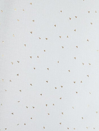 Voilage finitions dorées à oeillets